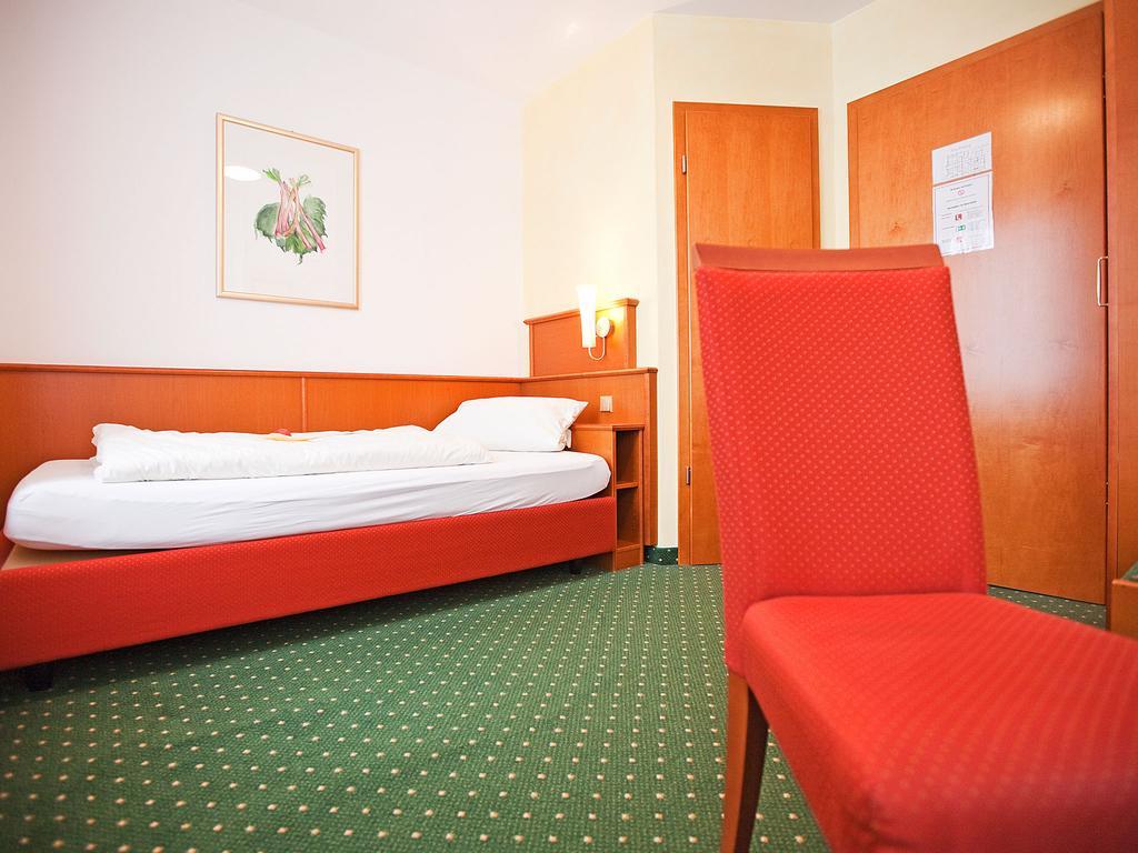 Hotel Widmann'S Loewen à Königsbronn Chambre photo